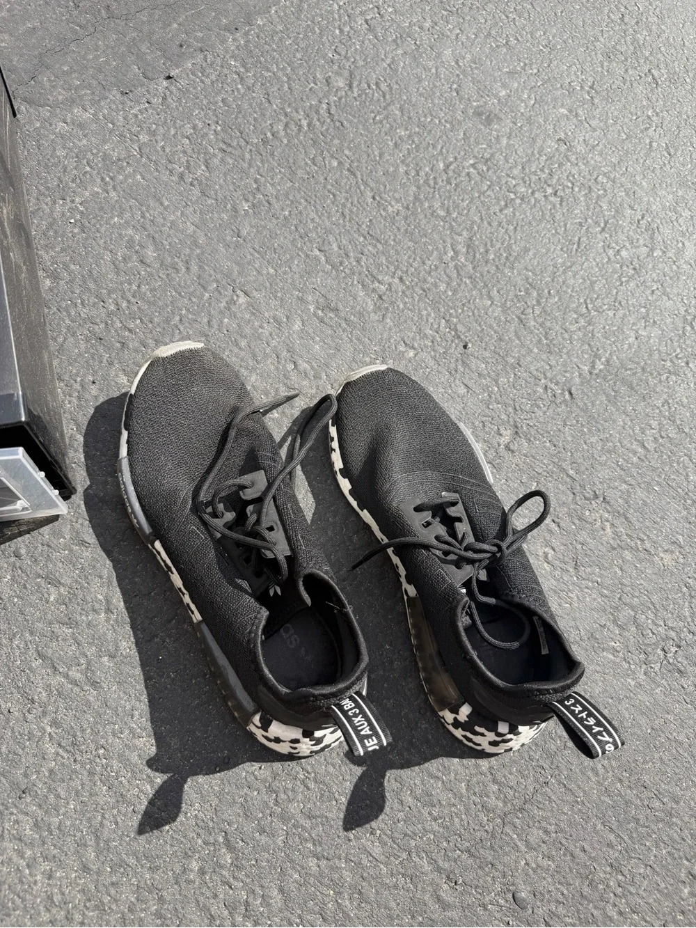 adidas Black Athletic Slip-On Sneakers with Black and White Patterned Heel
